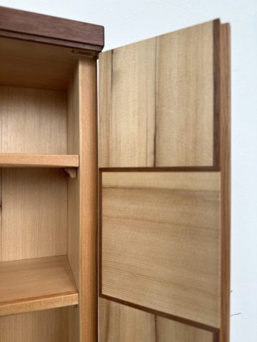fir wall cabinet with veneered parquetry